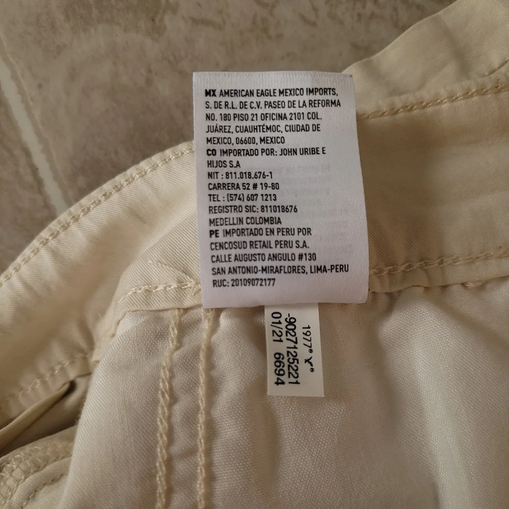 American Eagle Pleated Cream High-Waisted Mini Skirt - Picture 8 of 11